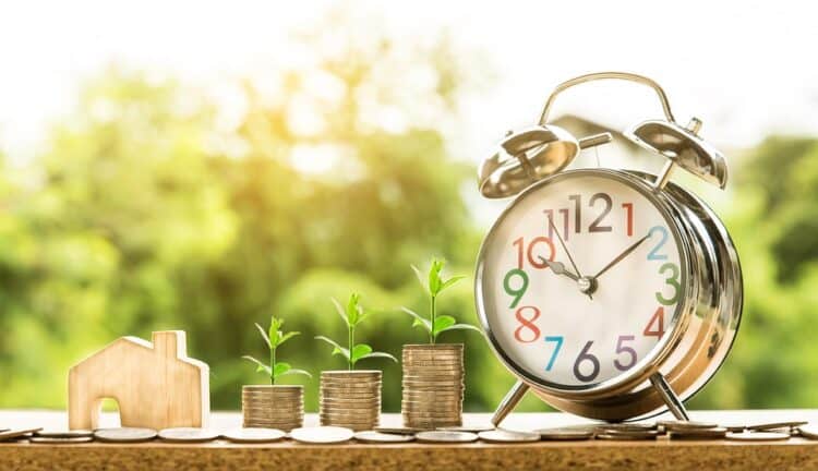 Growing property investments with clock and plant symbols representing market timing.